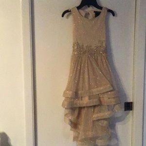 Beautiful gold high low formal girls dress.
